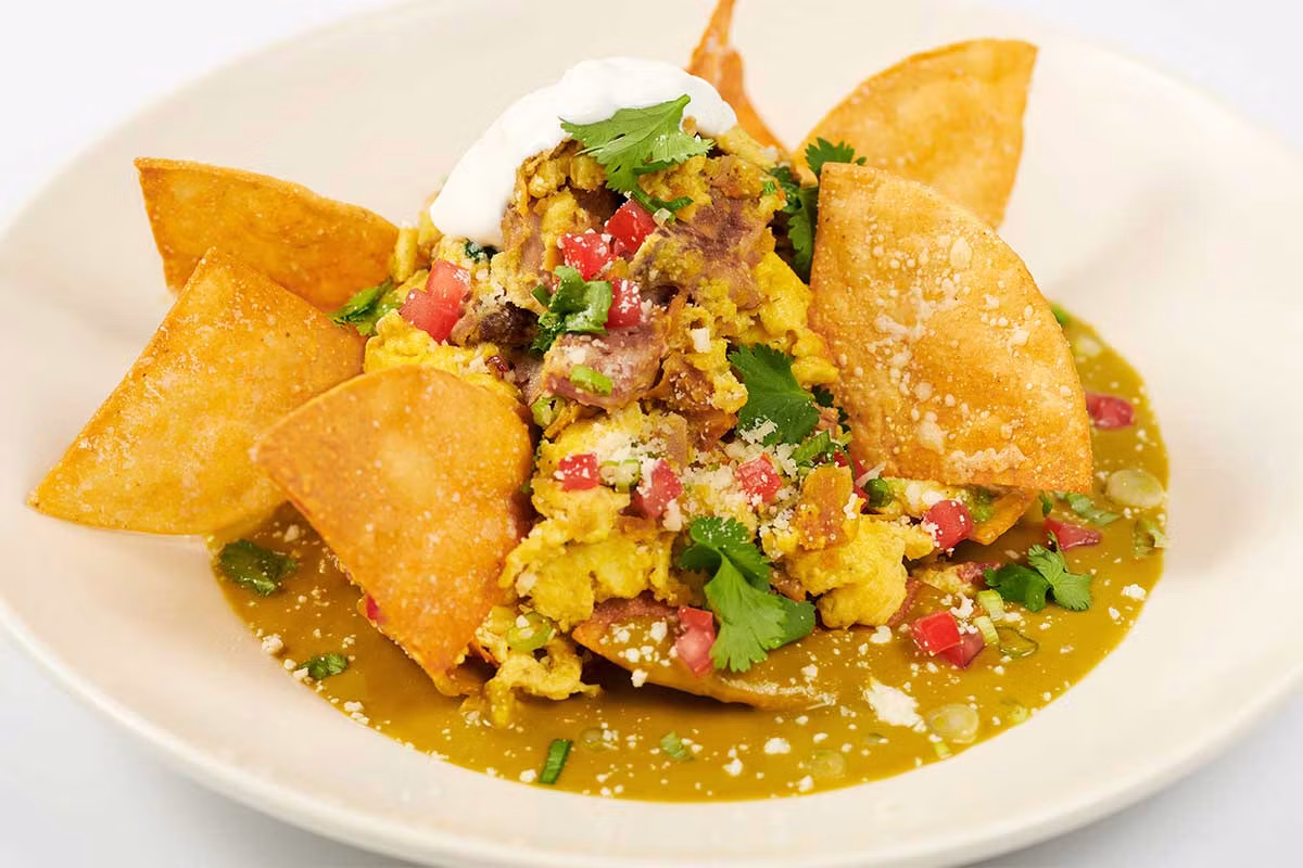 Green Chilaquiles with Carnitas and Eggs - The Cheesecake Factory Menu Prices 2026